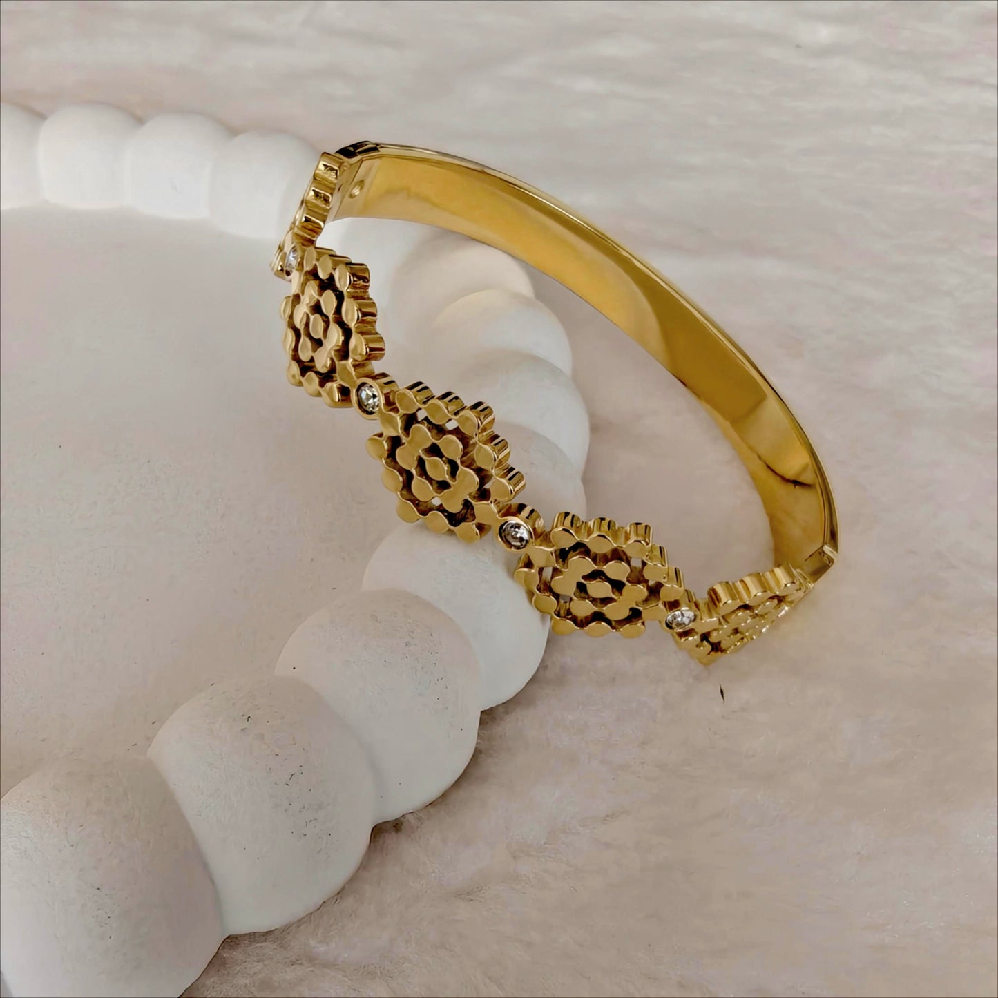 Gold Stainless Steel Hinged Bangle with Hexagonal Floral Motif & Crystals