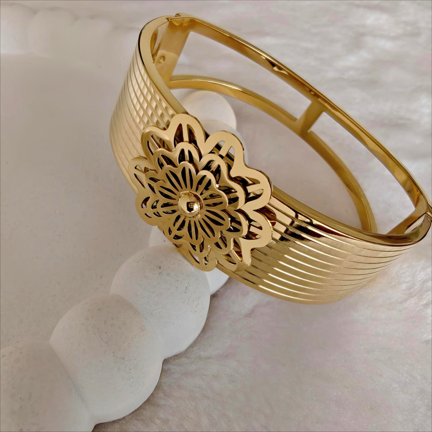 Gold Stainless Steel Wide Hinged Bangle with Floral Medallion
