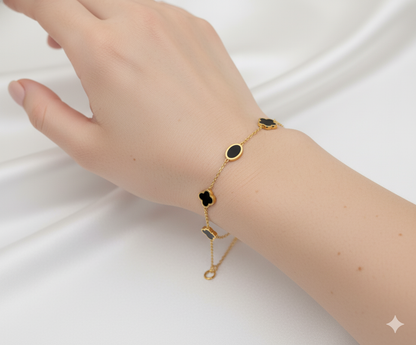 Gold Stainless Steel Chain Bracelet with Alternating Black Enamel Motifs