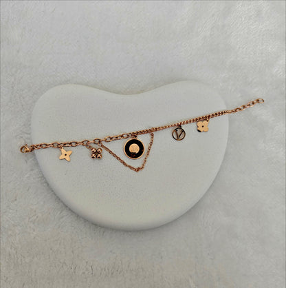Rose Gold Stainless Steel Charm Bracelet with Signature Motifs