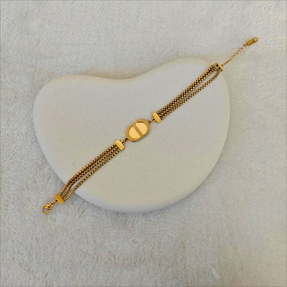 Gold Stainless Steel Triple Chain Bracelet with Oval Medallion