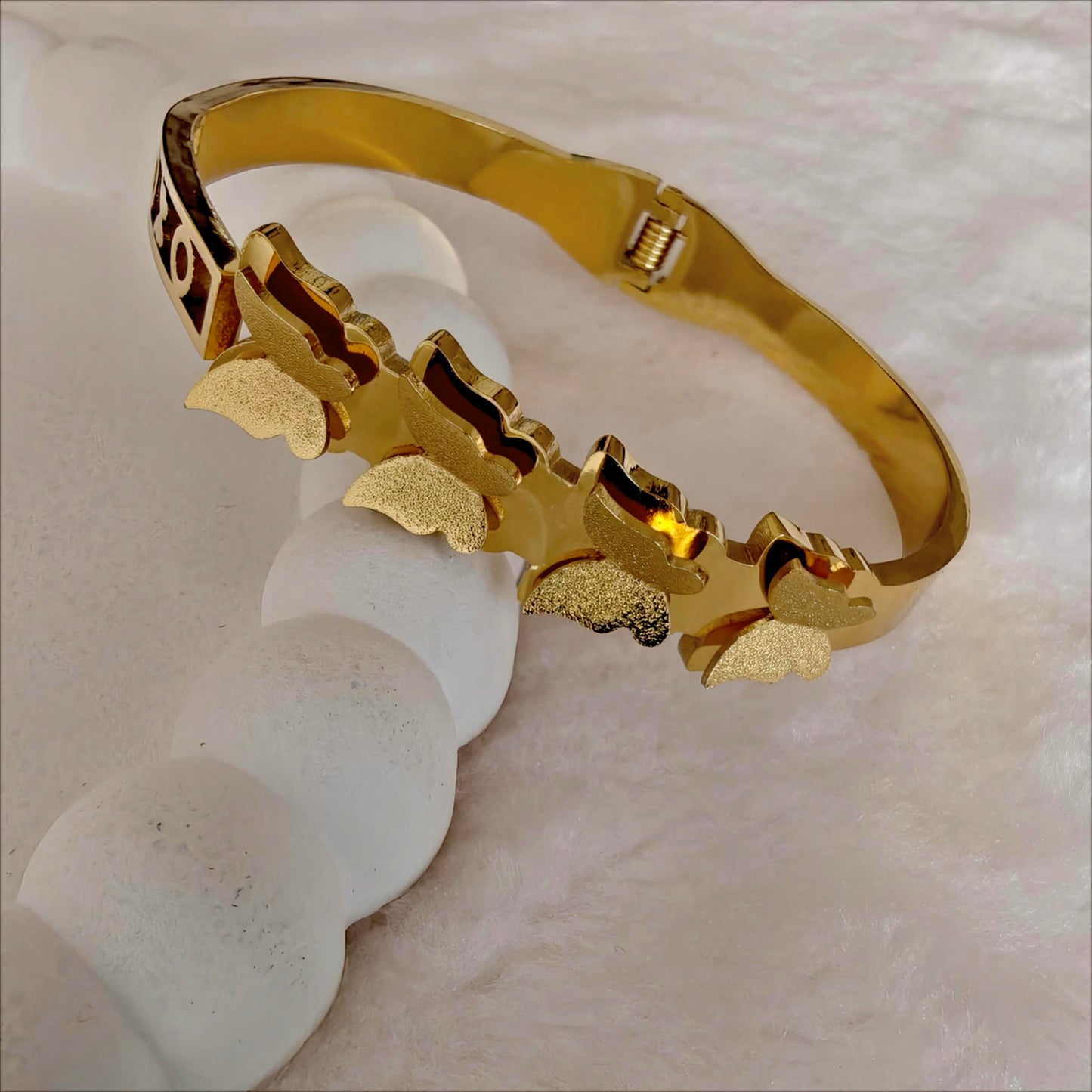 Gold Stainless Steel Hinged Bangle with Butterfly Motif
