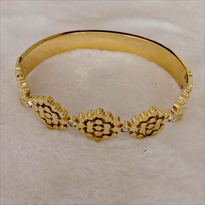 Gold Stainless Steel Hinged Bangle with Hexagonal Floral Motif & Crystals