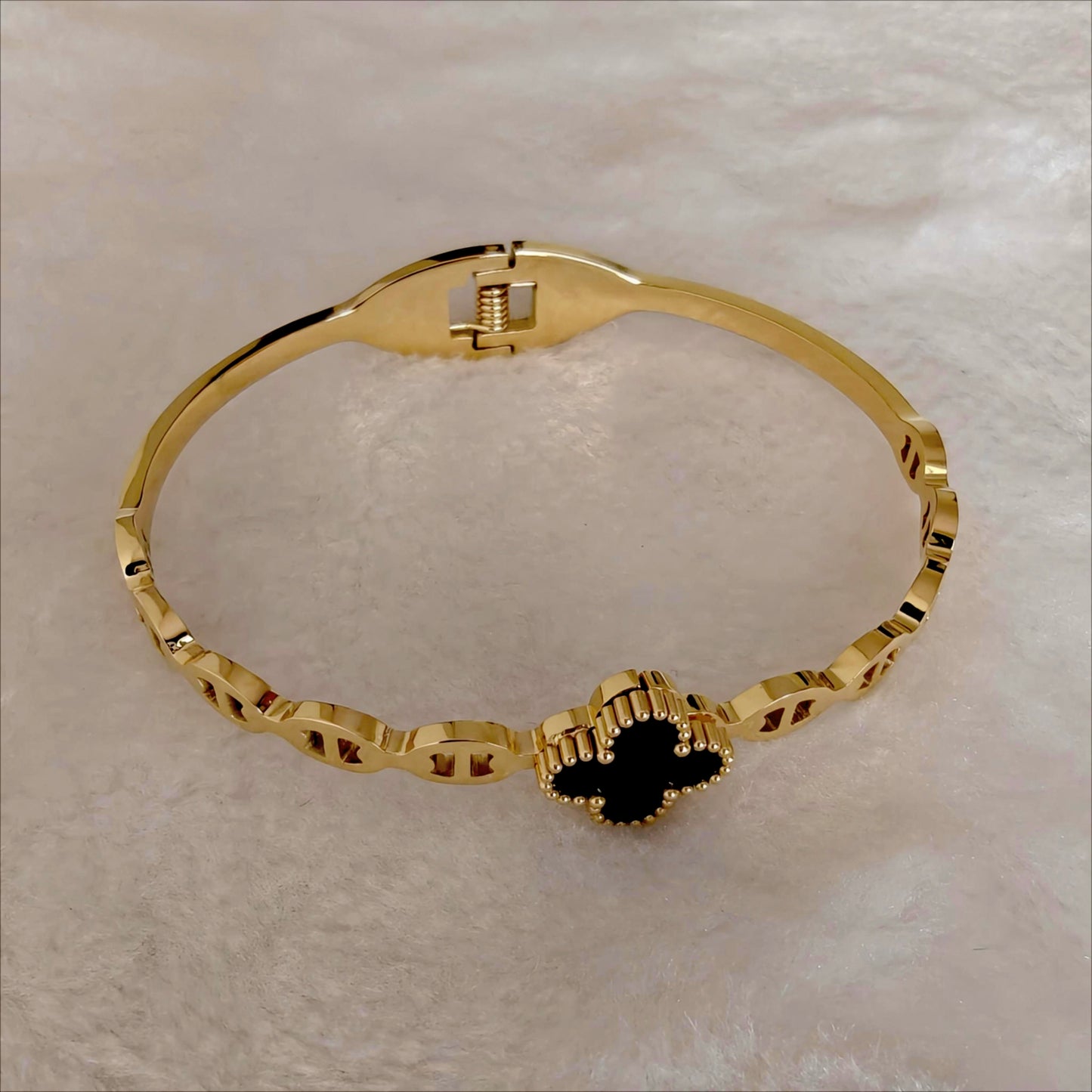 Gold Stainless Steel Hinged Bangle with Black Clover Enamel & Anchor Links