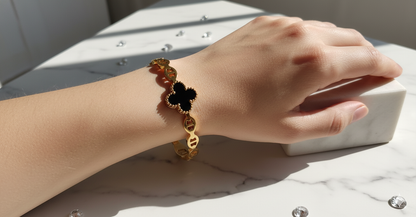 Gold Stainless Steel Hinged Bangle with Black Clover Enamel & Anchor Links