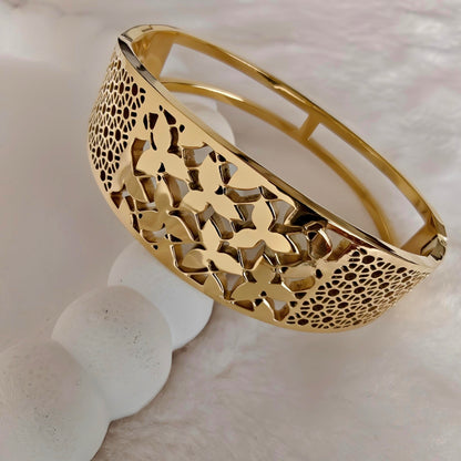 Gold Stainless Steel Oval Hinged Bangle with Floral Cutouts
