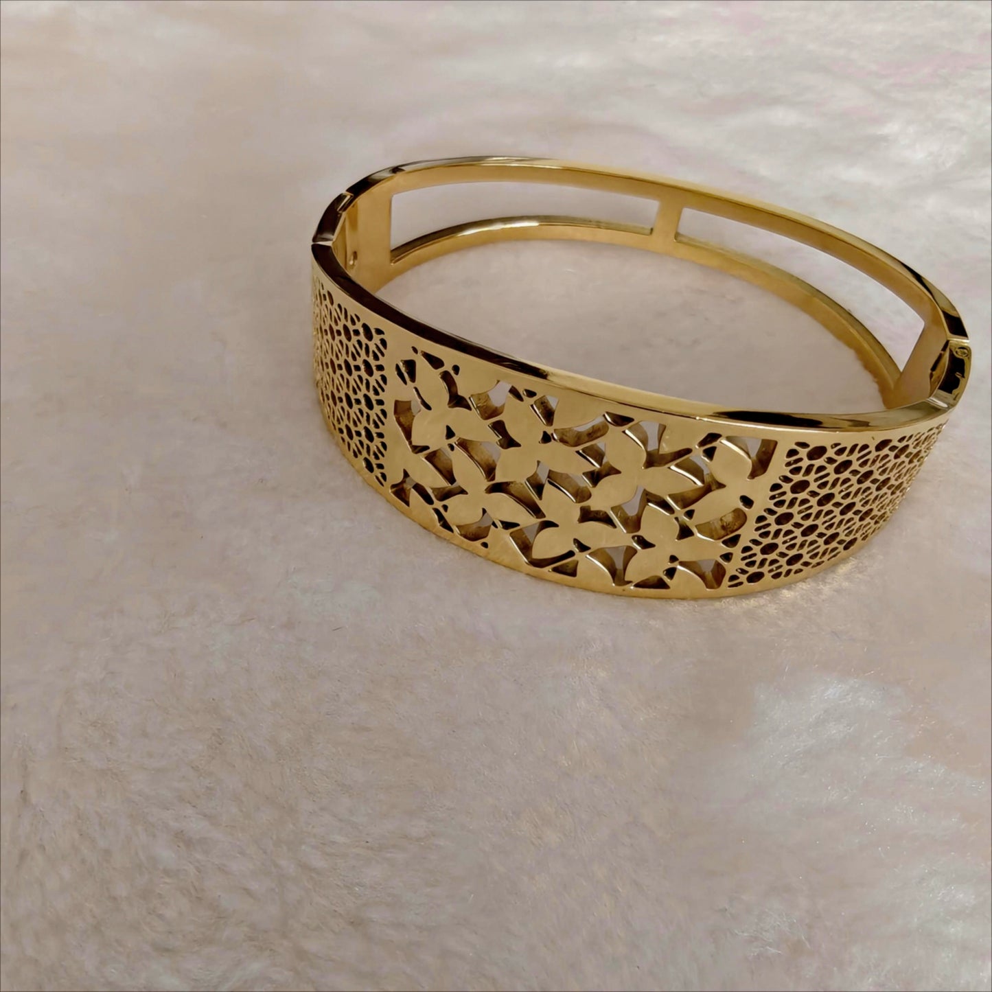 Gold Stainless Steel Oval Hinged Bangle with Floral Cutouts