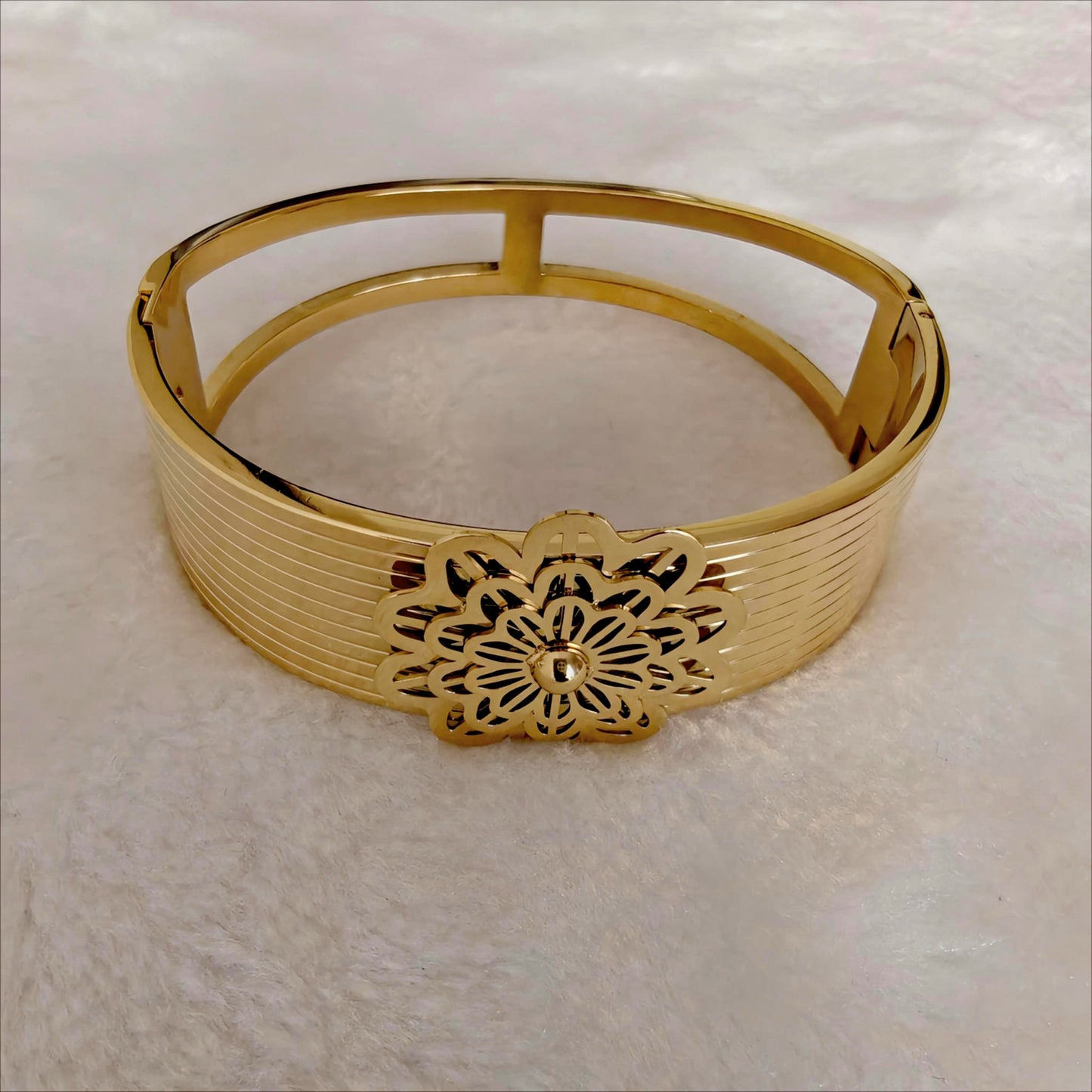 Gold Stainless Steel Wide Hinged Bangle with Floral Medallion