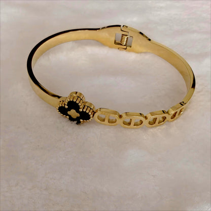 Gold Stainless Steel Hinged Bangle with Black Clover & Oval Links